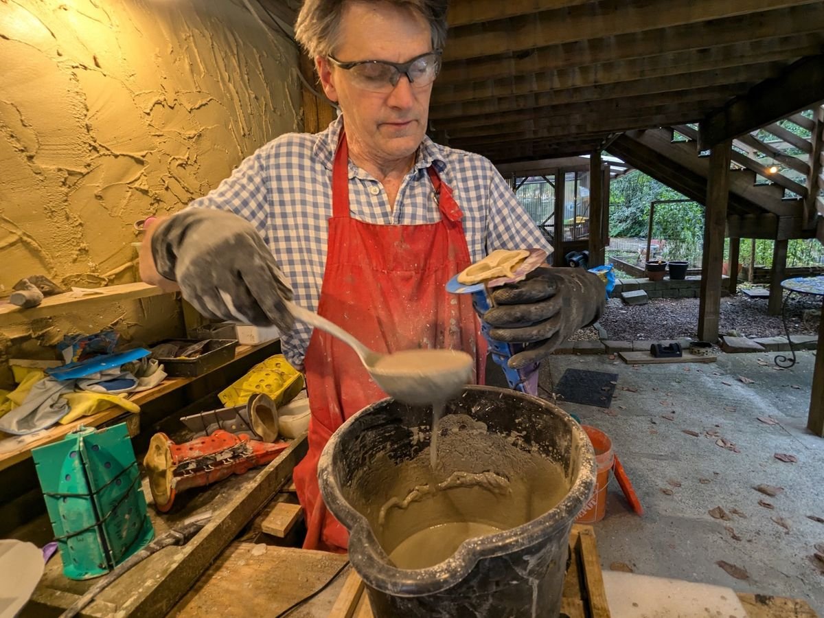 Cement being poured into a mold
